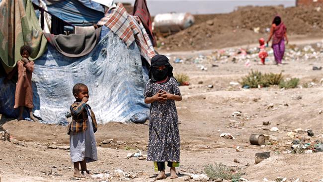 Displaced Yemeni children stand outside a make-shift shelter at a camp for internally displaced persons (IDPs) on the outskirts of Sana’a, Yemen, April 15, 2017. (Photo by AFP)