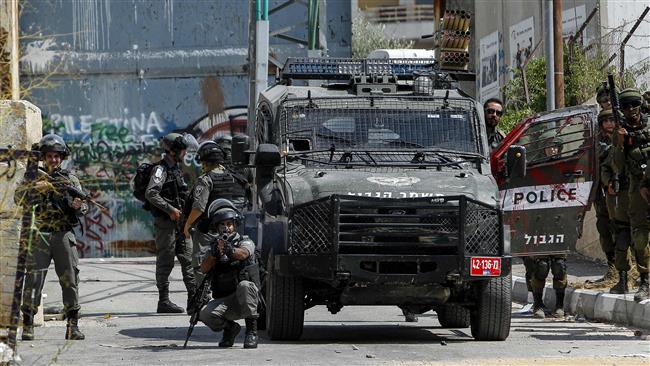 Israeli forces take aim towards Palestinian protesters during clashes following a demonstration at Aida refugee camp near the occupied West Bank city of Bethlehem on September 15, 2017. (Photos by AFP)