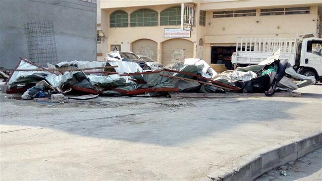 Banners marking the martyrdom anniversary of Imam Hussein (PBUH), the third Shia Imam and the grandson of the Prophet Mohammad (PBUH), are removed in Bahrain on September 19, 2017. (Photo by Lualua TV)