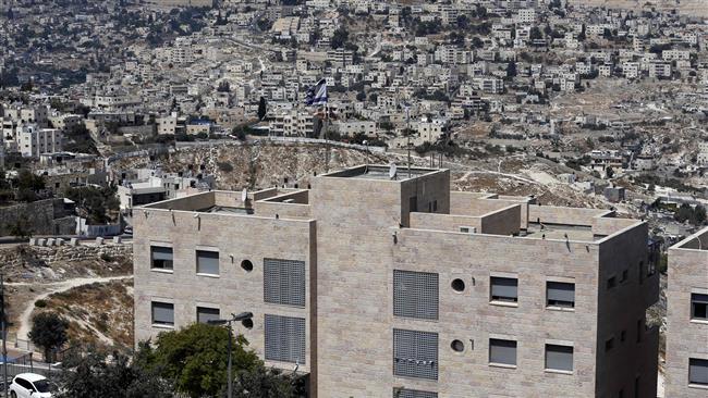 A picture taken on September 10, 2017 from Jabel Mukaber, a Palestinian neighborhood in the Israeli-occupied East Jerusalem al-Quds shows the Israeli settlement of Nof Zion in the foreground, and the Old City of Jerusalem al-Quds with the Dome of the Rock in the background. (Photo by AFP)