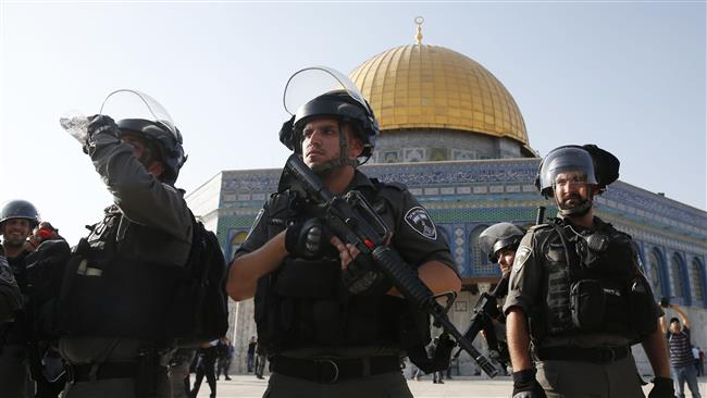 Israeli forces are seen in front of the Dome of the Rock in the al-Aqsa Mosque’s compound in the Old City of Jerusalem al-Quds on July 27, 2017. (Photo by AFP)