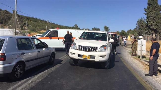 This photo shows the aftermath of an incident outside the entrance to the Palestine Technical University – Kadoorie campus in al-Arroub, occupied West Bank, on September 26, 2017 after an Israeli settler ran over a young Palestinian woman. (Photo by the Palestinian Information Center)