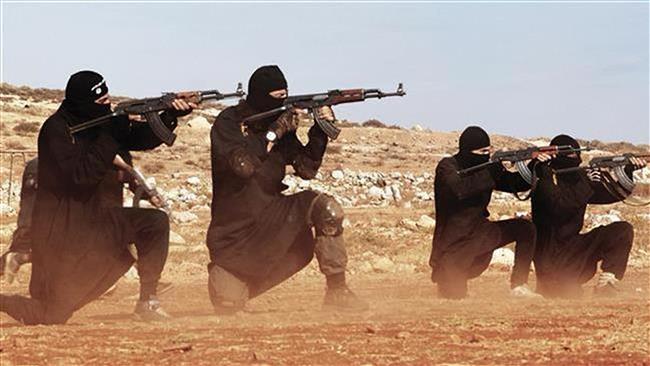The file photo shows Daesh terrorists in an unknown location.