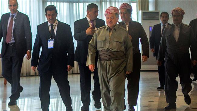 Iraqi Kurdish leader Massud Barzani (C-R) arrives to cast his vote in the Kurdish independence referendum at a polling station near Arbil, the capital of the autonomous Kurdish region of northern Iraq, on September 25, 2017. (Photo by AFP)