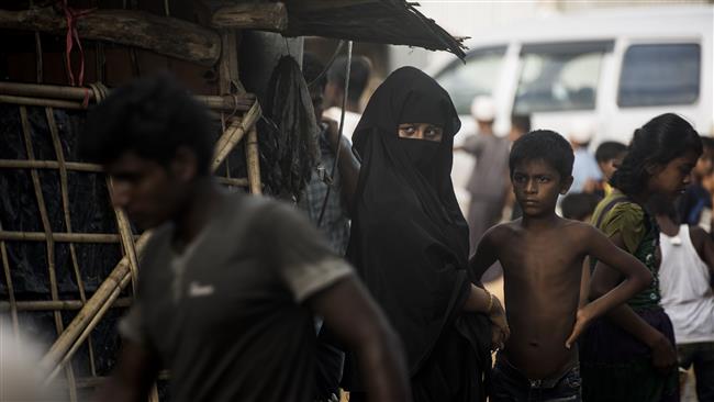 Rohingya Muslim refugees look on in Kutupalong refugee camp in the Bangladeshi district of Ukhia, September 30, 2017. (Photo by AFP)
