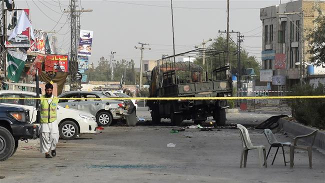 A burnt military vehicle is pictured after an attack late on August 12 in Quetta, Pakistan. (By AFP)