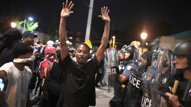 Demonstrators confront police while protesting the acquittal of former St. Louis police officer Jason Stockley on September 16, 2017 in St. Louis, Missouri. (Getty Images)