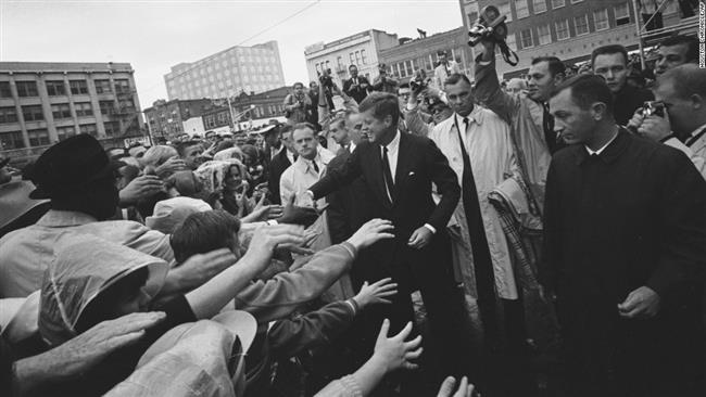 US President John F. Kennedy greets supporters during his visit to Fort Worth, Texas, November 22, 1963. Later that day he was assassinated.