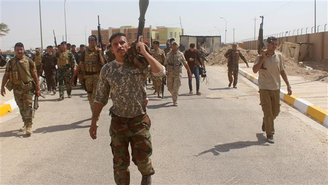 Iraqi forces patrol the city of Ramadi, west of Baghdad, on September 27, 2017. (Photo by AFP)