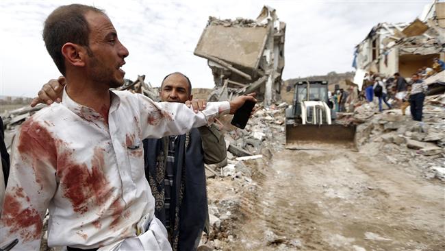 A Yemeni man covered in bloodstains reacts during a search for survivors in the debris of buildings hit in a Saudi-led airstrike in the residential southern Faj Attan District of the capital, Sana’a, on August 25, 2017. (Photo by AFP)