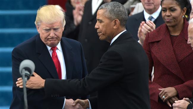 This AFP file image dated January 20, 2017 shows US President Barack Obama (R) greeting President-elect Donald Trump as he arrives on the platform at the US Capitol in Washington, DC, before his swearing-in ceremony.
