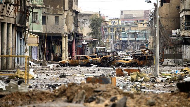 Cars burnt and destroyed are seen on a street during a battle between Iraqi forces and Daesh terrorists in Mosul, Iraq, on March 16, 2017. (Photo by Reuters)