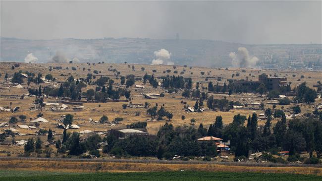 The picture, taken from the Israeli-occupied Golan Heights, shows smoke billowing from Syria after an Israeli aerial attack on June 25, 2017. (Photo by AFP)