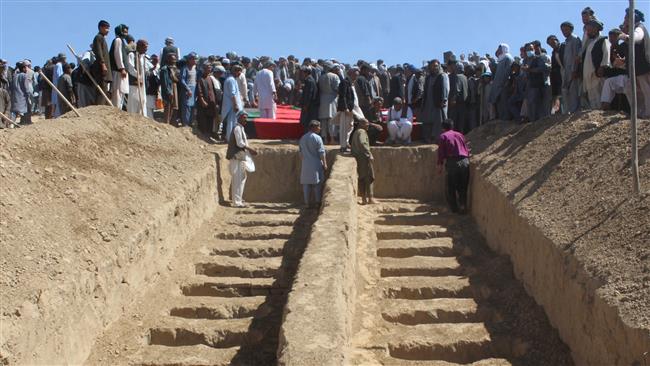 Graves are prepared for the burial of civilians who were killed by militants at Mirza Olang village in Sar-e Pul province, Afghanistan, August 16, 2017. (Photo by Reuters)