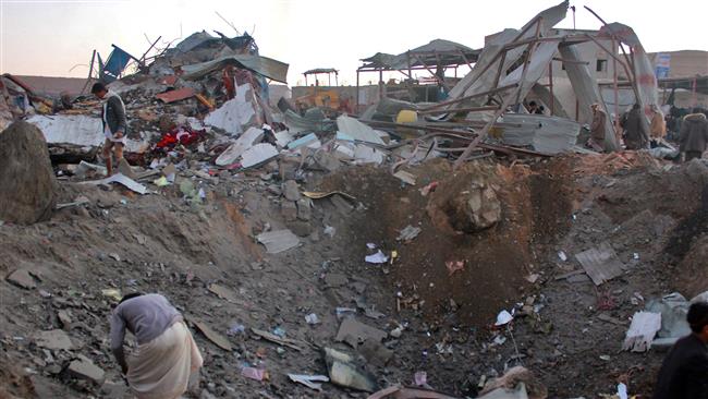 Yemenis check the aftermath of a Saudi-led airstrike on the Sahar district of the northern Yemeni province of Sa’ada on November 1, 2017. (Photo by AFP)
