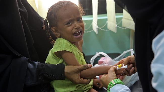 A Yemeni child suspected of being infected with cholera cries at a hospital in the Yemeni coastal city of Hudaydah on November 5, 2017. (Photos by AFP)