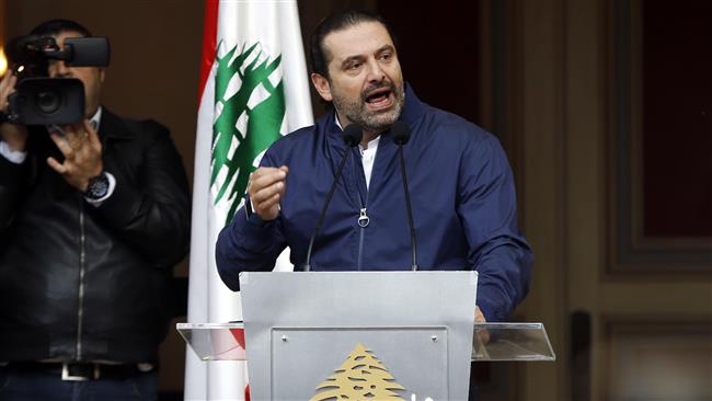 Lebanese Prime Minister Saad Hariri speaks to his supporters outside his residence in Beirut, Lebanon, November 22, 2017. (Photo by AP)