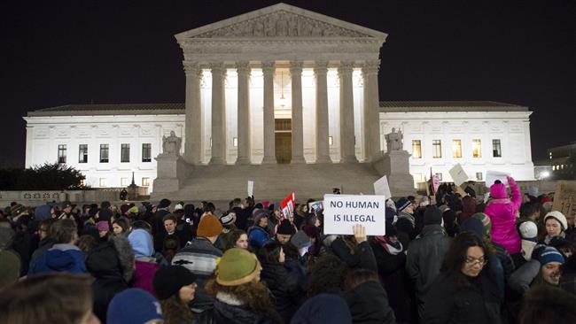 This file photo taken on January 30, 2017 shows a protest outside the US Supreme Court in Washington, DC, against Donald Trump’s travel ban.