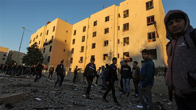 Palestinians look at the damage on December 9, 2017, in the aftermath of an Israeli airstrike in Beit Lahia, in the northern Gaza Strip. (Photo by AFP)