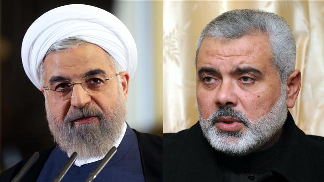 Iranian President Hassan Rouhani (L) and leader of Hamas resistance movement, Ismail Haniyeh