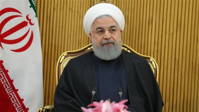 Iranian President Hassan Rouhani speaks to reporters in Tehran on December 12, 2017 ahead of his departure for Istanbul for an OIC emergency summit. (Photo by president.ir)