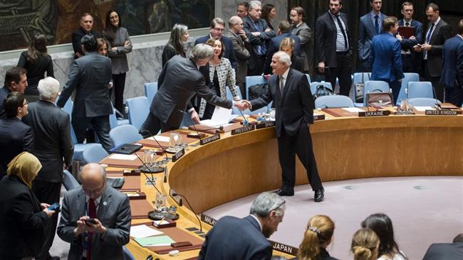 Palestinian UN envoy Riyad Mansour greets Spanish envoy Roman Oyarzun Marchesi ahead of the UN Security Council’s December 23, 2016, vote on Israeli settlements. (Photo by AFP)