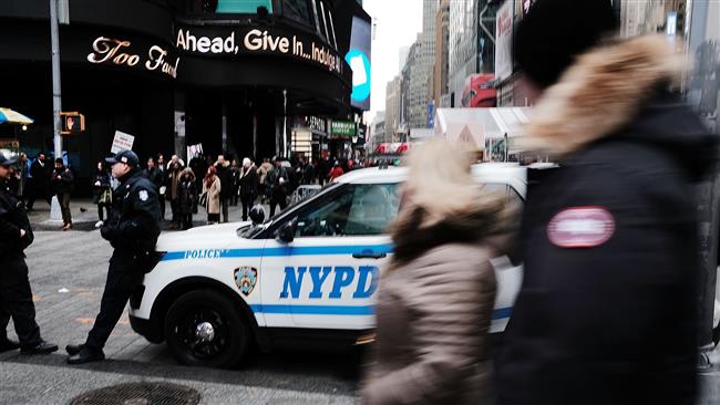 NEW YORK, NY - DECEMBER 12: New York City police stand on a corner in Times Square a day after a man prematurely detonated a suicide bomb in near-by Port Authority Bus Terminal on December 12, 2017 in New York City. A day after the would-be suicide attacker Akayed Ullah, 27, detonated a pipe bomb strapped to his body, much of Manhattan was back to normal despite a higher police presence. Spencer Platt/Getty Images/AFP == FOR NEWSPAPERS, INTERNET, TELCOS & TELEVISION USE ONLY ==