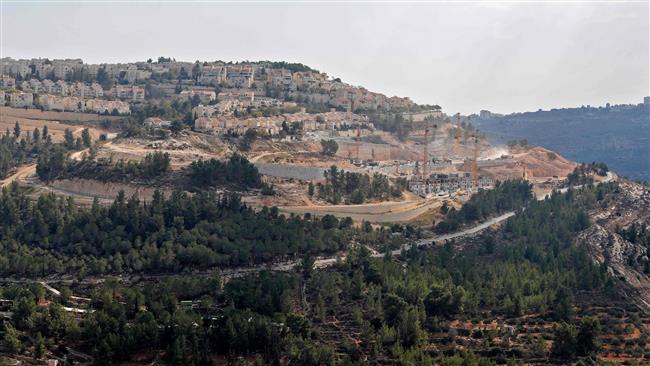 A picture taken on November 8, 2017 shows a general view of construction work in Gilo settlement in the mainly Palestinian eastern sector of Jerusalem al-Quds. (Photo by AFP)