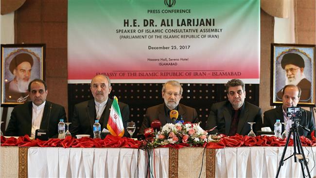 Iranian Parliament Speaker Ali Larijani (C) speaks to reporters in Islamabad, Pakistan, on December 25, 2017. (Photo by ICANA)