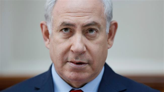 Israeli Prime Minister Benjamin Netanyahu attends a weekly cabinet meeting at his Jerusalem al-Quds office, December 17, 2017. (Photo by AFP)