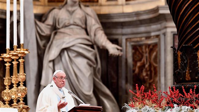Pope Francis delivers a message as he leads the holy mass to mark the world day of peace, in St. Peter’s Square at the Vatican, on January 1, 2018. (Photo by AFP)