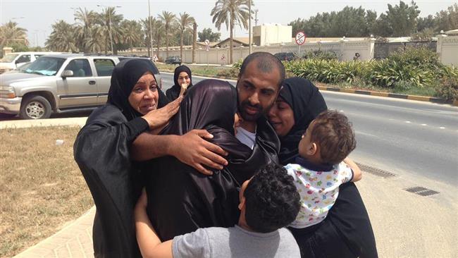 This file photo shows Ahmed Ali al-Attiya (C), who has been deported to neighboring Saudi Arabia by Bahraini officials over his support for prominent Shia cleric, Sheikh Isa Qassim.
