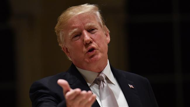 US President Donald Trump speaks to reporters at Trump International Golf Club in West Palm Beach on January 14, 2018. (Photo by AFP)