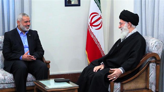 This file photo shows Ismail Haniyeh (R), Hamas’ political bureau chief, during a meeting with Leader of the Islamic Revolution Ayatollah Seyyed Ali Khamenei, in Tehran, on February 11, 2012. (By khamenei.ir)