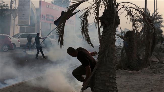 Bahraini protesters clash with riot police during a demonstration in Daih village, Bahrain, on May 23, 2015. (Photo by AP)