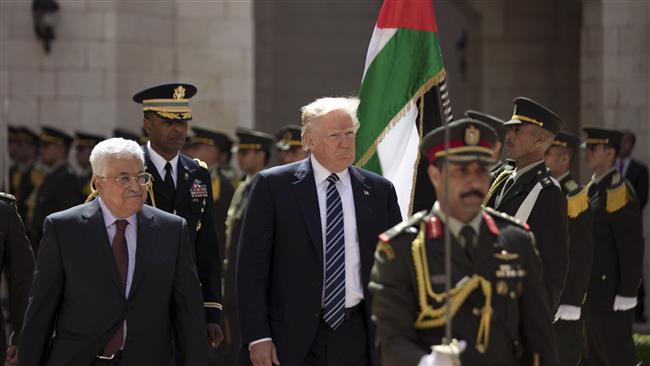 Palestinian Authority President Mahmud Abbas (L) and US President Donald Trump are seen during a welcome ceremony at the Presidential Palace in Bethlehem on May 23, 2017. (Photo by AFP)