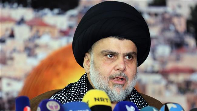 Iraqi Shia cleric Muqtada al-Sadr addresses the media in the city of Najaf in central Iraq on December 7, 2017. (Photo by AFP)