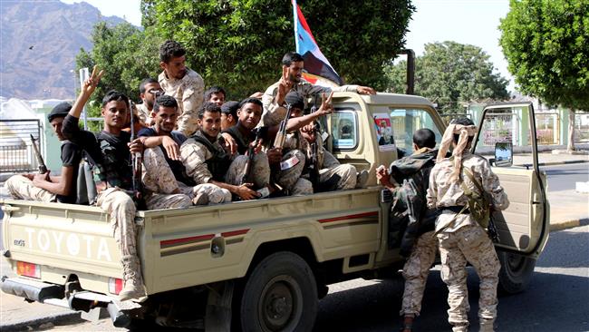 UAE-backed southern Yemeni separatists ride on the back of a truck in Aden, Yemen, January 29, 2018. (Photo by Reuters)