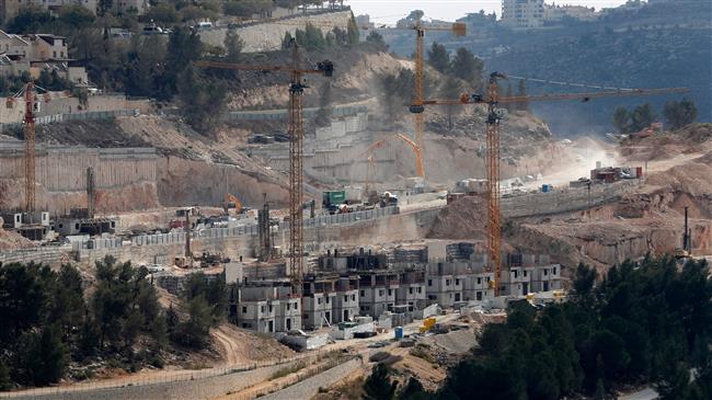 A picture taken on November 8, 2017 shows a general view of construction work in the Gilo settlement in the mainly Palestinian eastern sector of occupied Jerusalem al-Quds. (Photo by AFP)