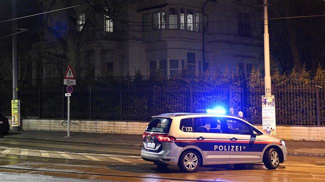 Police officers gather outside the Iranian ambassador’s residence in Vienna on early on March 12, 2018 where a 26-year-old Austrian was shot dead after he attacked a guard with a knife. (Photo by AFP)