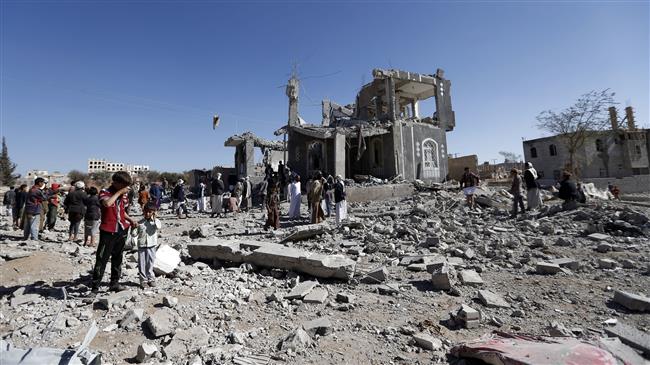 Yemenis check the damage in the aftermath of a Saudi airstrike in the Yemeni capital Sana’a on March 8, 2018. (Photo by AFP)