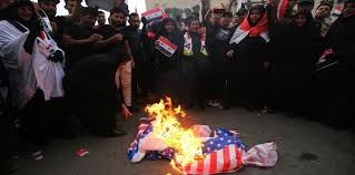 Iraqis burn US flags, shout