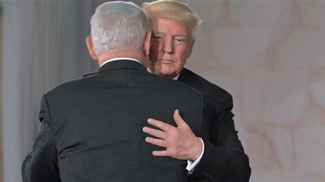 US President Donald Trump (R) and Israeli Prime Minister Benjamin Netanyahu hug after speaking at the Israel Museum in Jerusalem on May 23, 2017. (Photo by AFP)