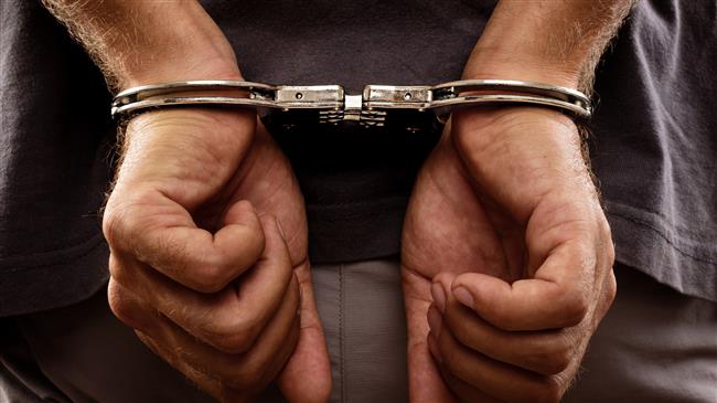 hands of an arrested man