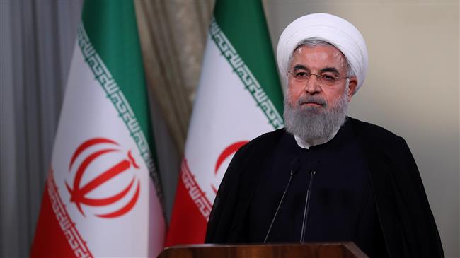 A handout picture provided by the Iranian presidency on May 8, 2018 shows President Hassan Rouhani giving a speech on Iranian TV in Tehran. (Photo via AFP)