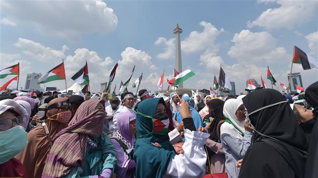 Indonesian Muslims attend a rally in Jakarta on May 11, 2018, to protest against US decision to relocate its embassy to Jerusalem al-Quds. (AFP photo)