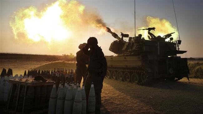 Israeli forces fire 155-mm artillery cannons at the Gaza Strip from their position near the border between the occupied Palestinian territories and the coastal enclave. (File photo)