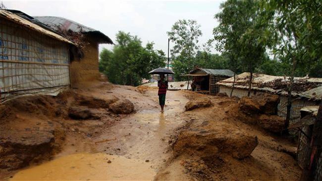 This handout photo, released by Save the Children on April 19, 2018, shows pools of water at a refugee camp for Rohingya refugees in Cox’s Bazar district in Bangladesh, following rains ahead of the monsoon season. (Via AFP)