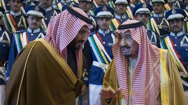 Saudi King Salman bin Abdulaziz Al Saud (R) and his son, Crown Prince Mohammed bin Salman