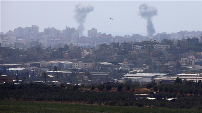 Smoke rises following an Israeli airstrike in the Gaza Strip, as seen from the occupied territories on May 29, 2018. (Photo by Reuters)